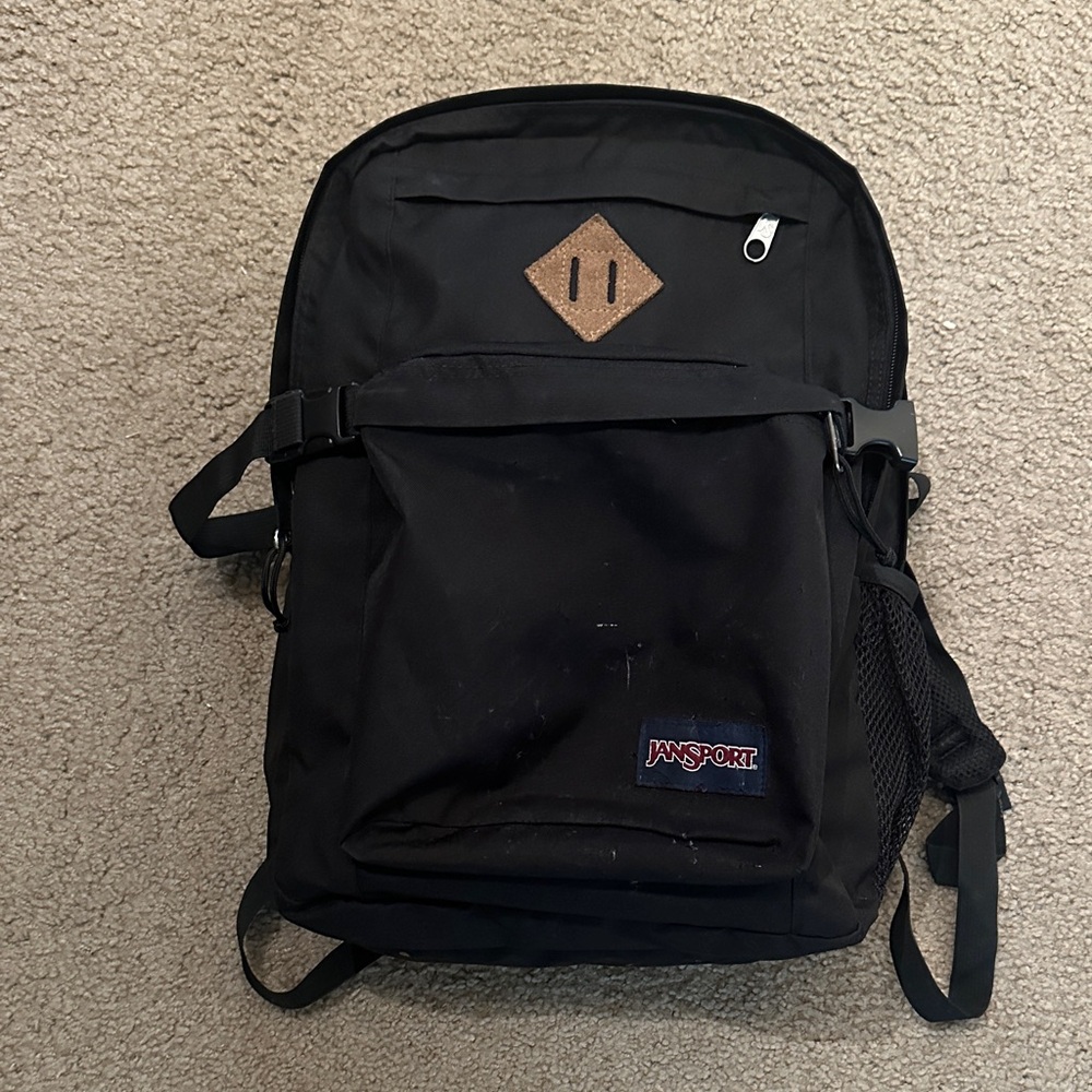 JanSport Unisex Backpack Black School Travel Laptop Bag Brown Patch One Size